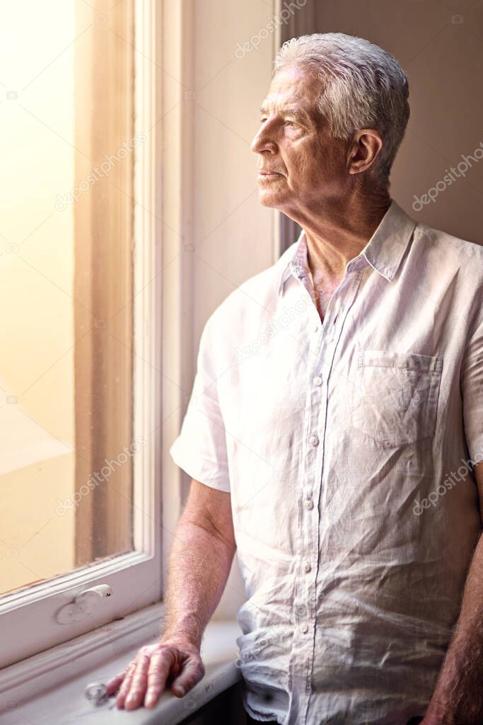 Love leaves a memory no one can steal. Shot of a senior man looking thoughtful.