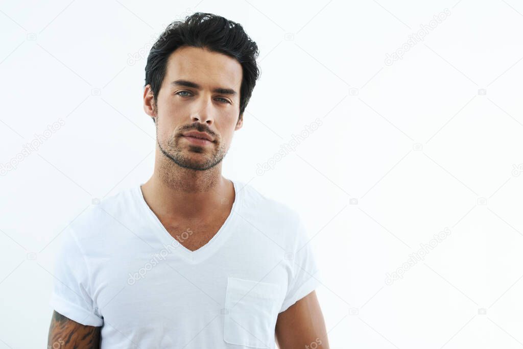 I make this shirt look good. Shot of handsome man wearing a white t-shirt.