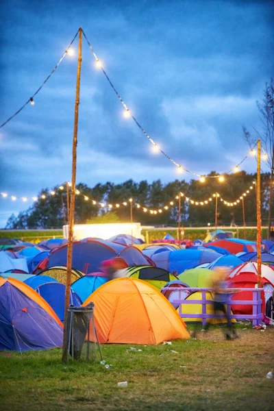 Colorful camp. Shot of a large group of tents at an outdoor festival. — Stock Photo, Image