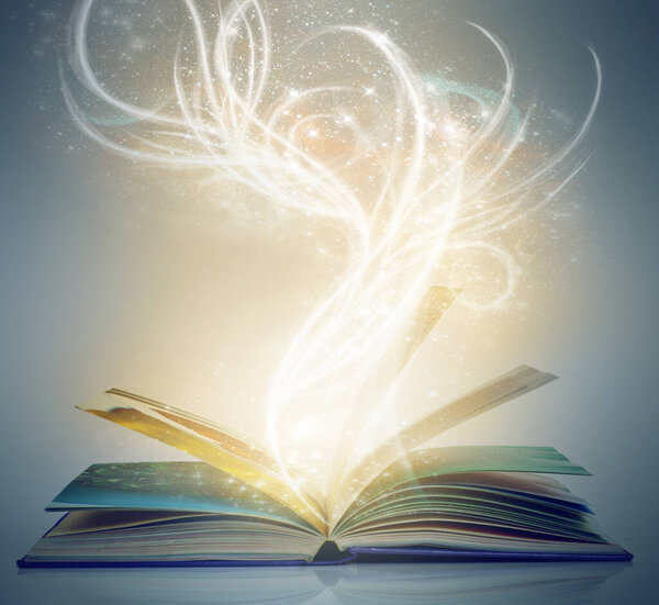 A book on an isolated background with a bright,magical glow emanating from it.