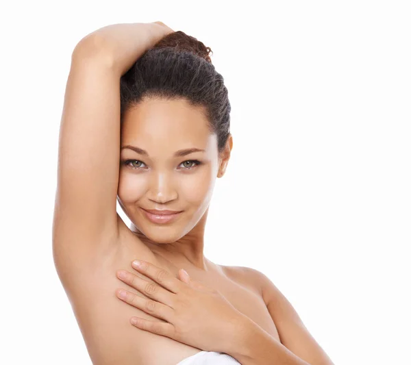 Smooth and silky. Portrait of a beautiful young woman showing her underarm. — Stock Photo, Image