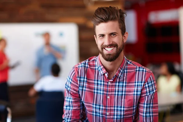 Hes the office go-getter. Portrait of a young male designer in a casual work environment. — Stock Photo, Image
