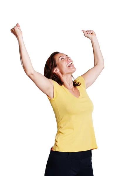 Celebrando su éxito. Foto de estudio de una mujer celebrando con los brazos extendidos en el aire aislados en blanco. — Foto de Stock