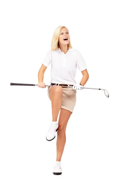 When I get mad, my clubs tend to snap. Studio shot of a young golfer holding her golf club over her knee to snap it in frustration isolated on white. — Stock Photo, Image