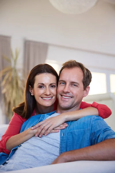 Quality couple time. Portrait of a mature couple relaxing together at home. — Stock Photo, Image