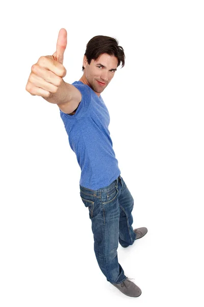 Giving you the go-ahead. High angle studio portrait of a handsome young man showing thumbs up. — Stock Photo, Image