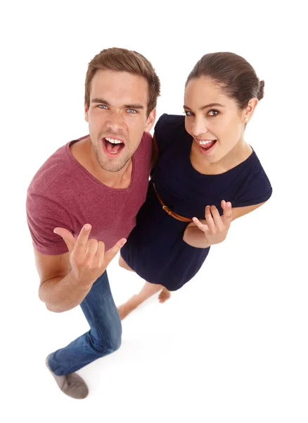 Vacation time - oh yeah. Full length studio shot of a young couple looking excited. — Stock Photo, Image