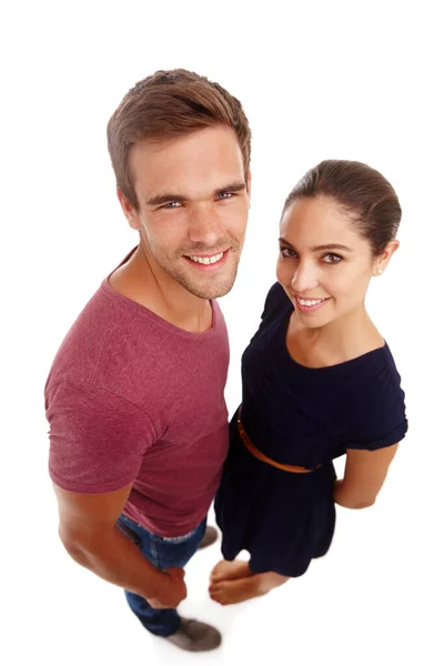 Bedankt, cupido. Studio portret van een aantrekkelijk jong paar. — Stockfoto