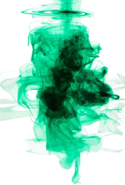 Brilliant green color explosion. Studio shot of green ink in water against a white background. — Stock Photo, Image