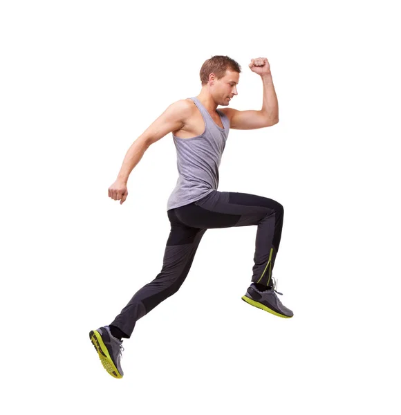 Bieganie to kompletny trening. Sideway studio ujęcie człowieka biegnącego przez ramę odizolowany na białym. — Zdjęcie stockowe
