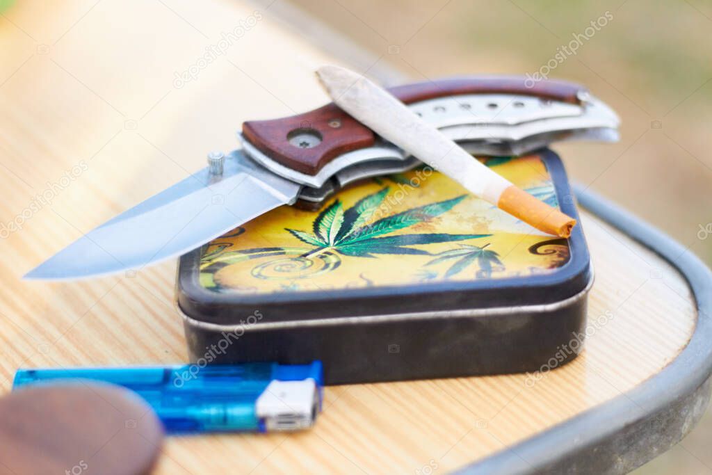 Rebels tools. Cropped shot of a marijuanaamp039s smokers kit.