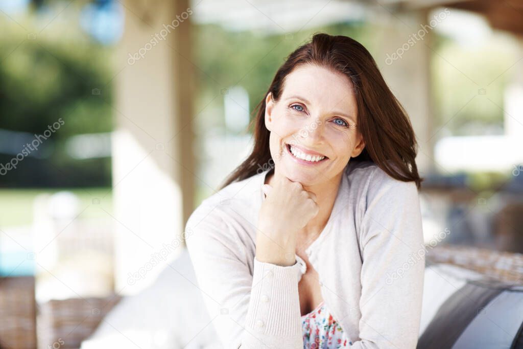 The sunlight and fresh air does wonders for me. Portrait of an attractive woman having a relaxing time outdoors.