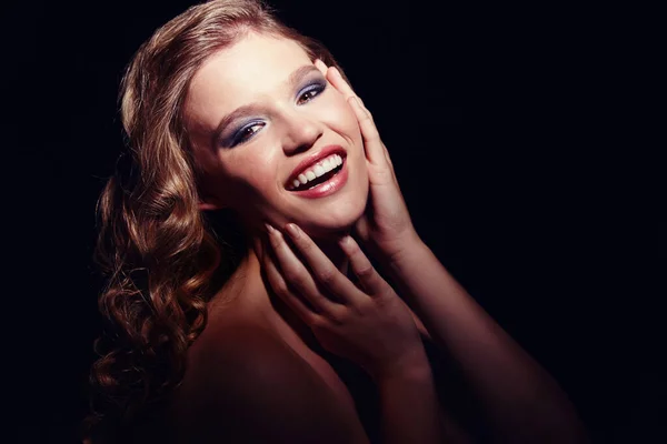 Feeling gorgeous. A beautiful young woman posing against a black background. — Stock Photo, Image