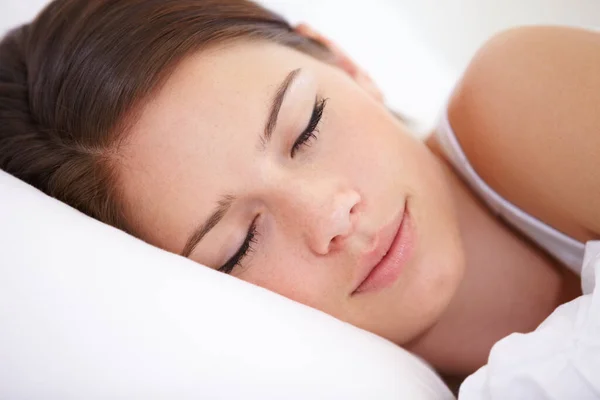 Beauty sleep. A young woman fast asleep. — Stock Photo, Image