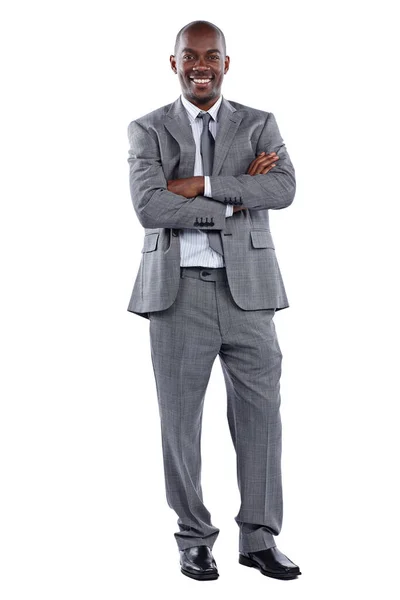 Im good for business. Full length portrait of a businessman standing with his arms folded against a white background. — Stock Photo, Image