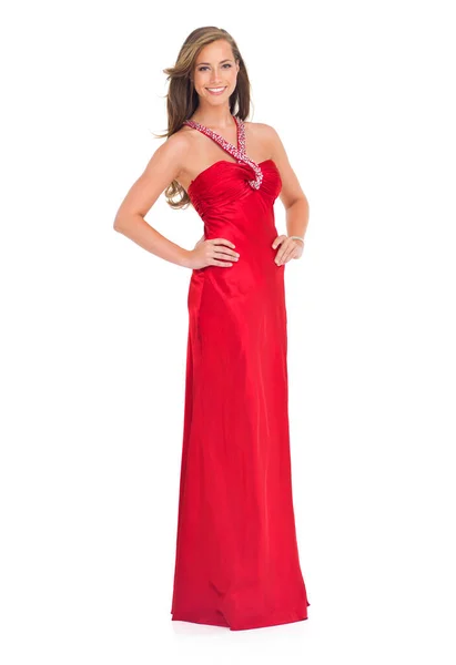 Qué belleza y elegancia. Estudio de una mujer joven con estilo en un vestido rojo aislado en blanco. — Foto de Stock