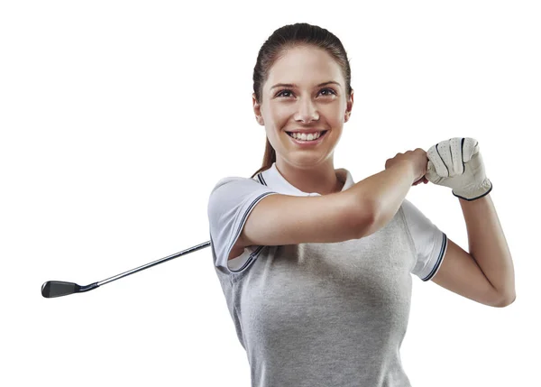 Mit ihrem Verein vertrauensvoll umgehen. Studioaufnahme einer jungen Golferin, die ihren Schwung isoliert auf Weiß übt. — Stockfoto