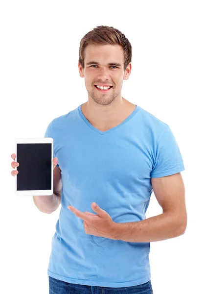 Convenience through technology. Studio shot of a young man holding a digital tablet. Stock Image