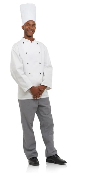 Vive para cocinar. Captura de estudio de un joven chef aislado en blanco. — Foto de Stock