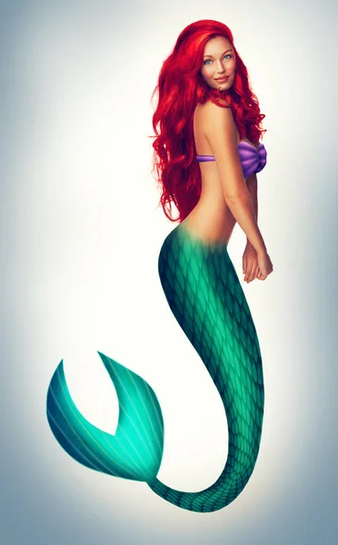 Today is going swimmingly. Shot of a beautiful red-headed mermaid. — Stock Photo, Image