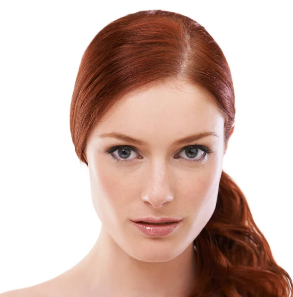 Theres a touch of elegance about her beauty. Studio shot of a redheaded woman isolated on white. — Stock Photo, Image