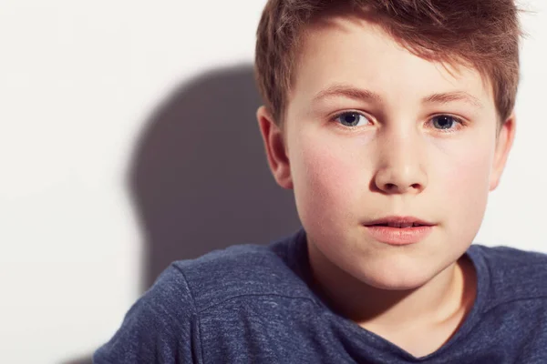 Facing life with expectation. Cropped portrait of a young preteen boy against a white background. — Stock Photo, Image