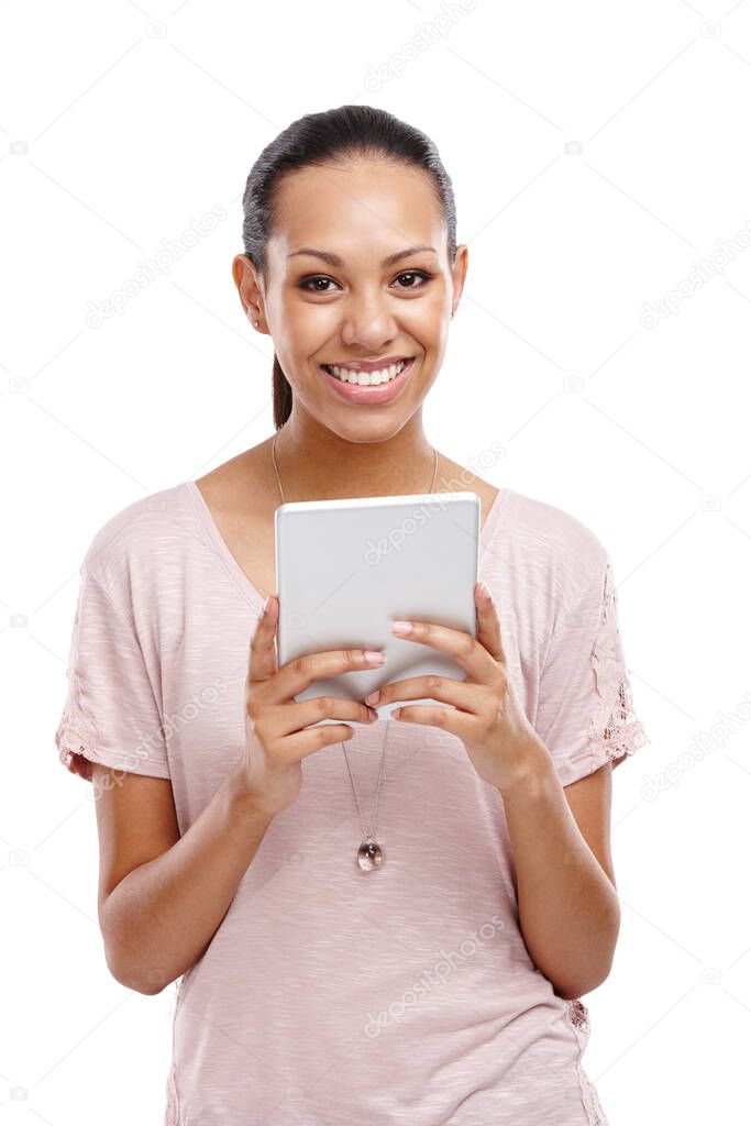 It keeps me on track. Portrait of an attractive young woman holding a digital tablet isolated on white.