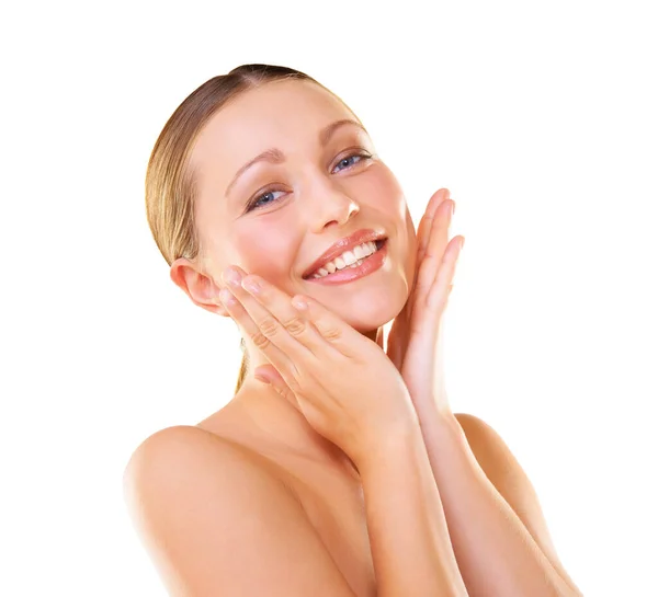 Skin so soft you will smile. Studio portrait of an attractive model touching her cheeks isolated on white. — Stock Photo, Image