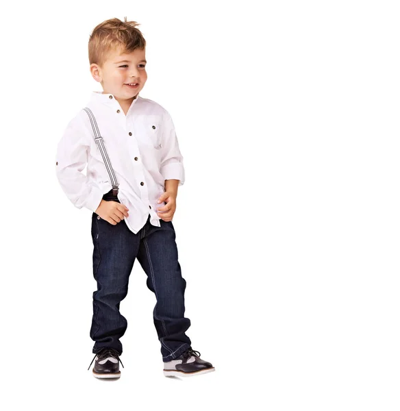 Одягнений, щоб справити враження. Милий маленький хлопчик позує на білому тлі . — стокове фото