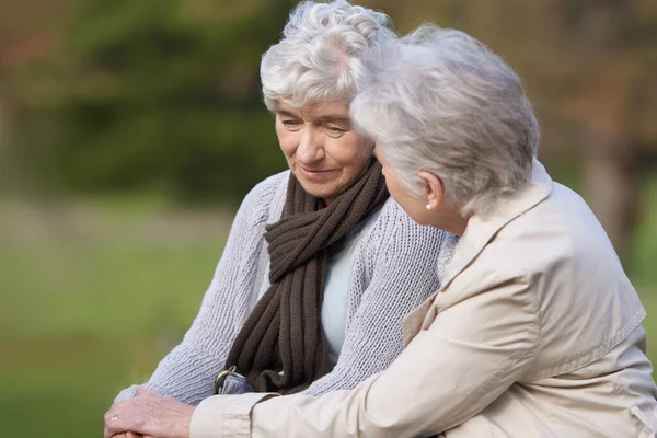 Im here for you.... Cropped view of a senior woman caring for her friend. — Stock Photo, Image
