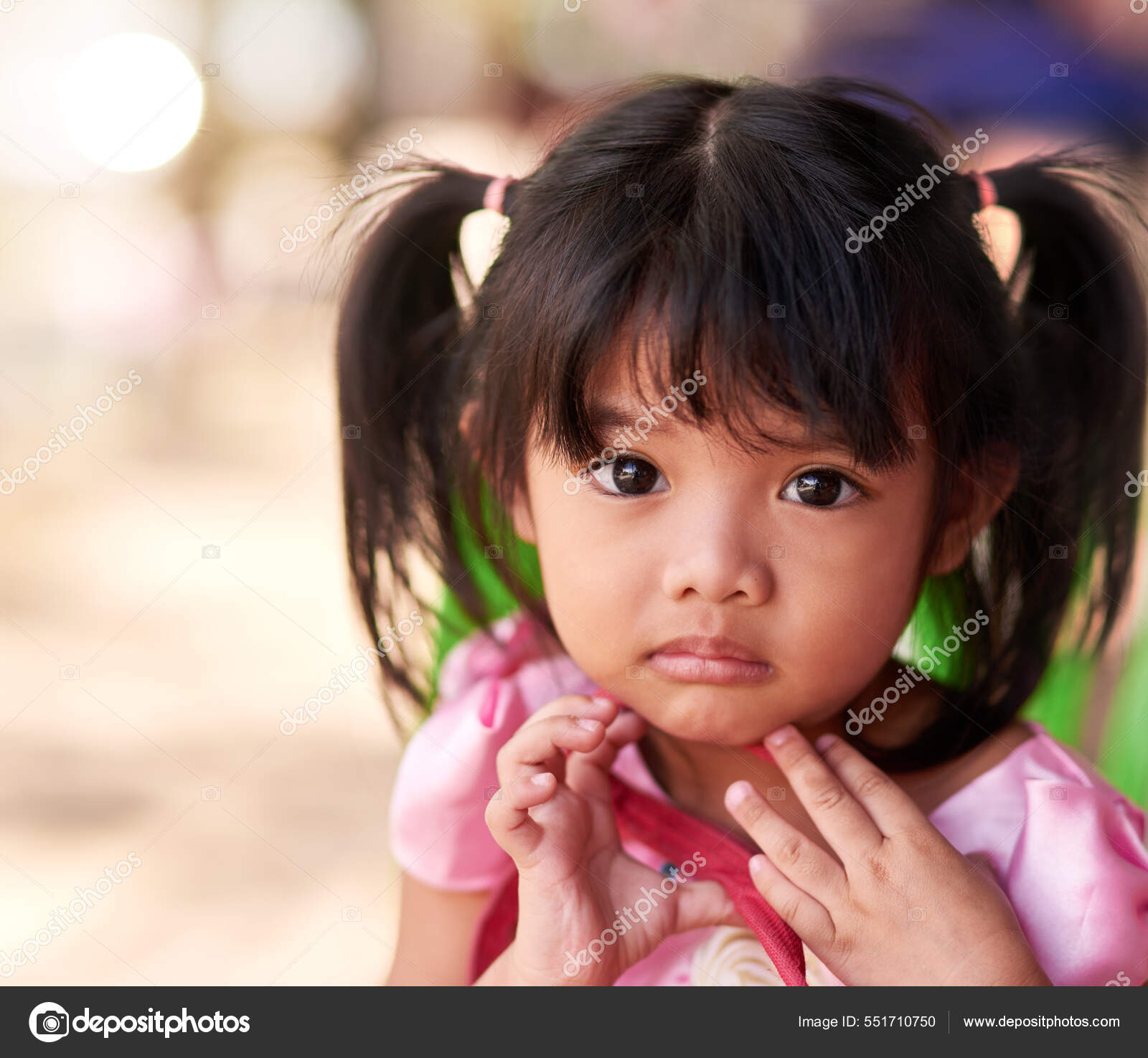 The face of innocence. Portrait of a little girl spending time outdoors ...