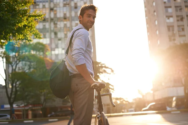 Take a bike. Shot of a businessman commuting to work with his bicycle. — Stock Photo, Image