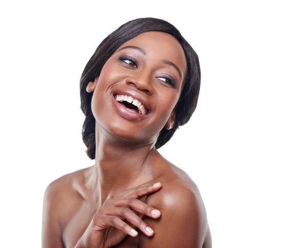 Laughter and beauty. A beautiful young woman with bare shoulders posing against a white background. — Stock Photo, Image