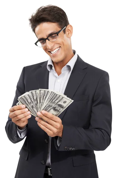 Making money. Studio shot of a handsome young businessman isolated on white. — Stock Photo, Image