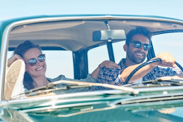 We needed this trip. Cropped shot of an affectionate couple enjoying a summer road trip. — Stock Photo, Image