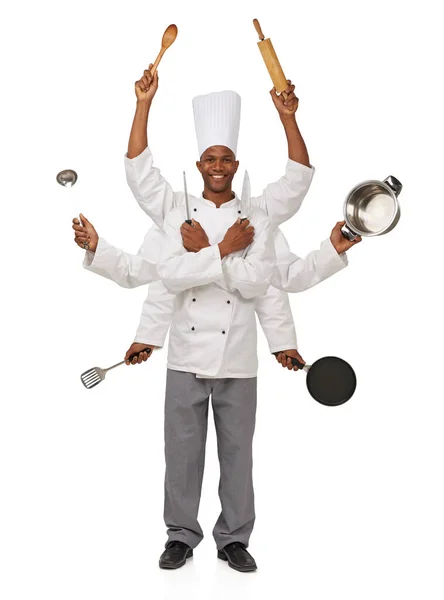 Multi-tasking je hra na kuchaře. Šéfkuchař s osmi pažemi, v nichž jsou různé kuchyňské potřeby.. — Stock fotografie