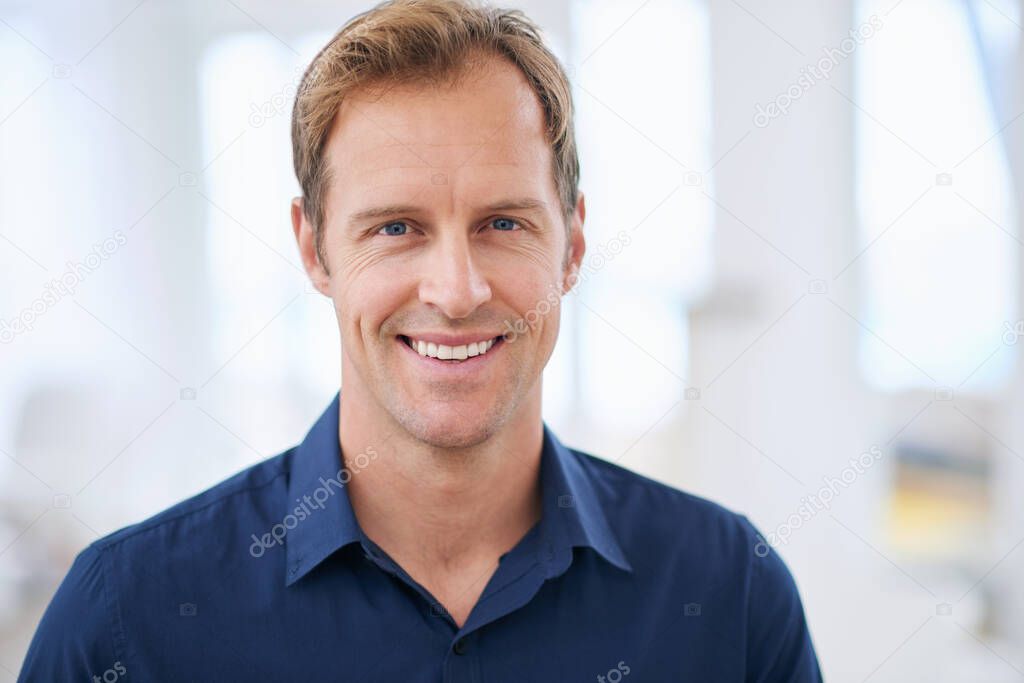 Hes in a great mood. Cropped portrait of a handsome man at home.