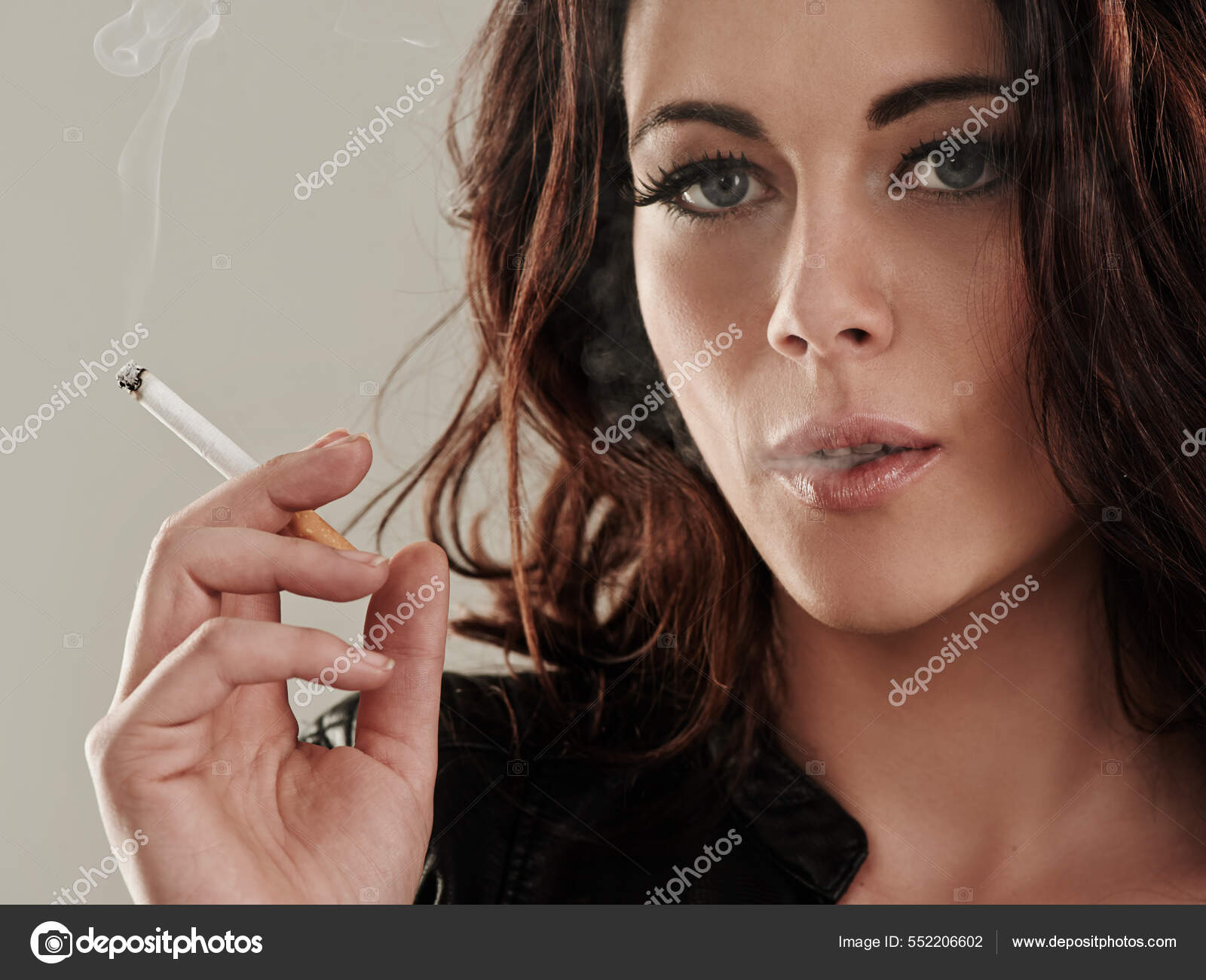 bad girl smoking Shes a bad girl by nature. Portrait of an attractive young woman smoking a  cigarette. — Stock Photo © PeopleImages.com #552206602