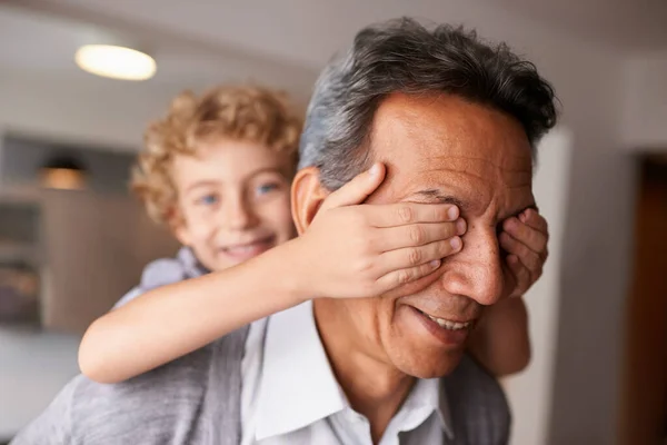 Grandpas are the best. Shot of a playful little boy and his grandfather. — Stock Photo, Image