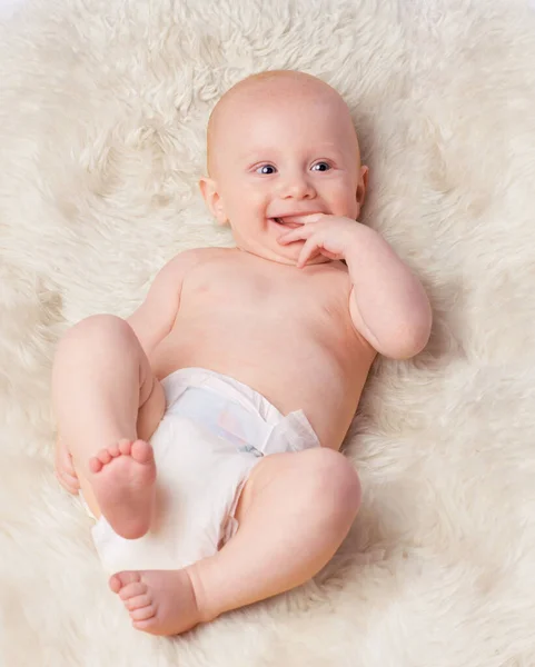 Hes his moms little angel. Cropped shot of an adorable baby boy in a studio. — Stock Photo, Image