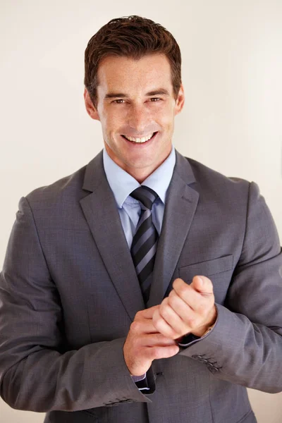 Business with style. Studio shot of a handsome businessman posing against a white background. — Stock Photo, Image