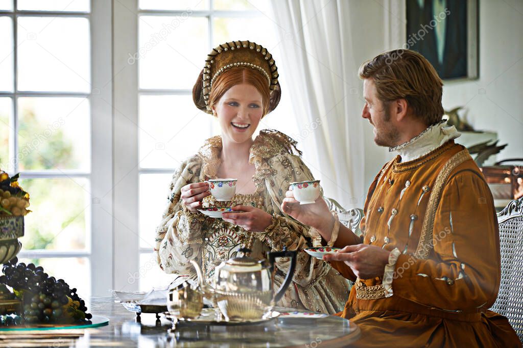 Tea with the Count. A king and queen taking tea together at home.