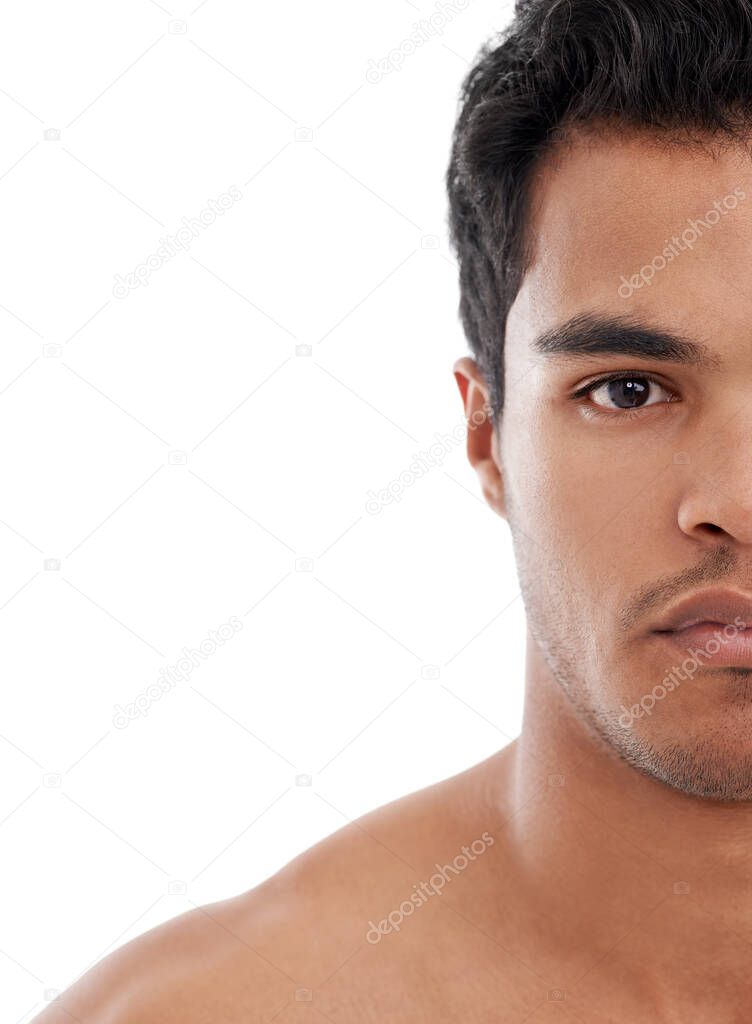 Handsome and confident. Cropped portrait of a handsome young man.