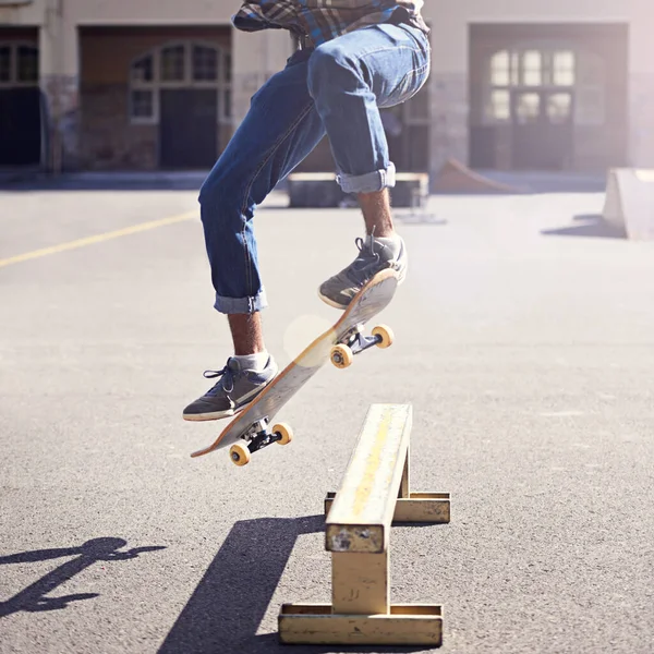 Hes got moves. Cropped shot of a young man doing a skateboarding trick. — Stock Photo, Image