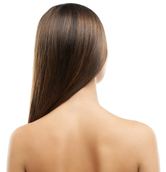 Soins capillaires perfectionnés. Vue arrière d'une jeune femme aux cheveux longs et luxueux isolés sur fond blanc. — Photo
