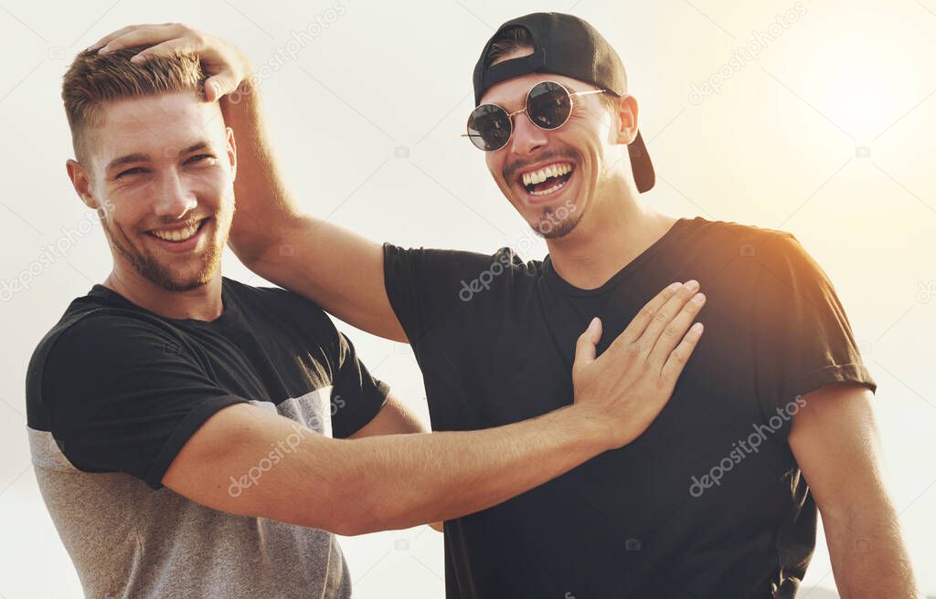 My wingman of choice. Portrait of two happy friends enjoying the day outside together.