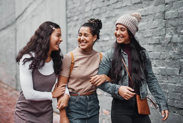 Sister bonding time. Cropped shot of an attractive group of sisters bonding during a day out in the city together. — Stock Photo, Image