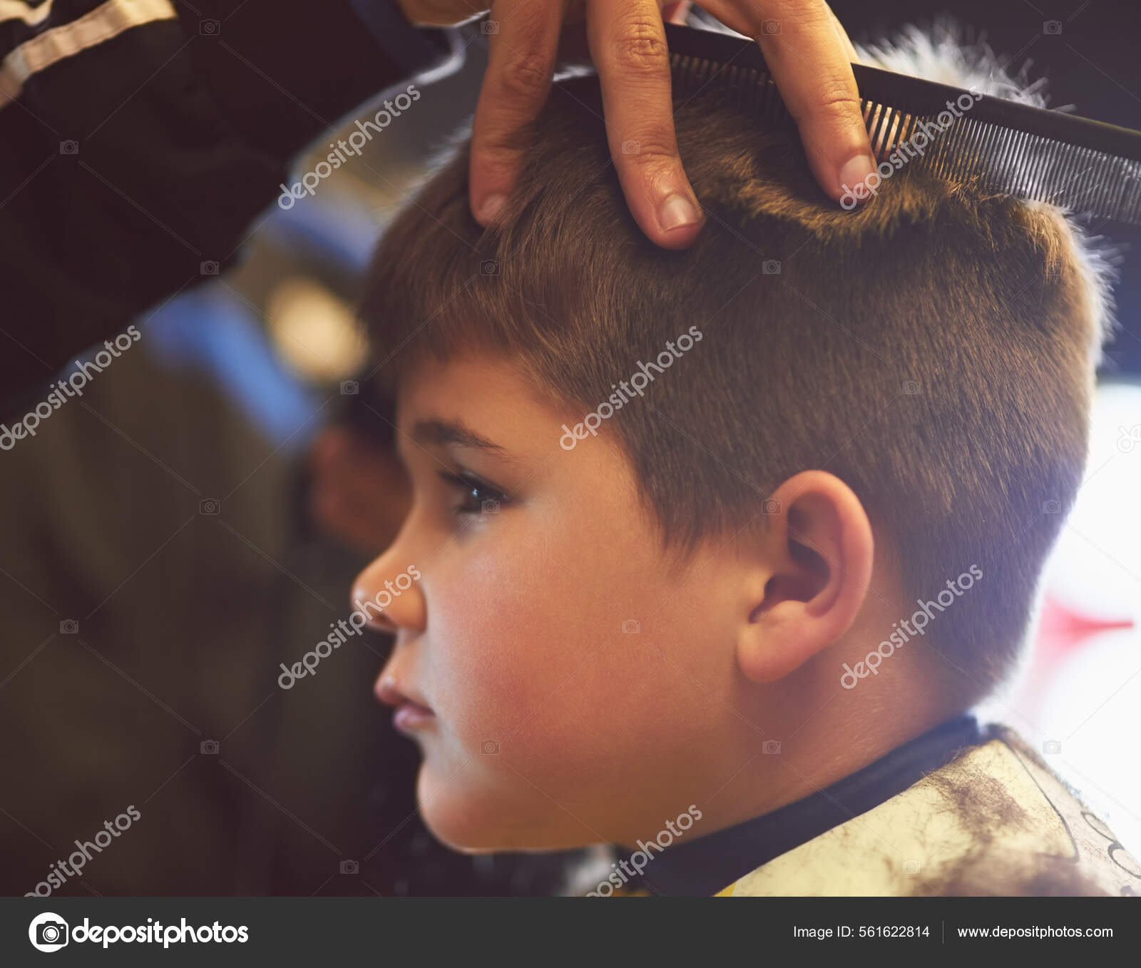 Just a bit of the top Closeup shot of a young boy getting