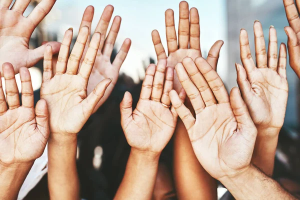 We have questions. Cropped shot of a group of unrecognizable peoples hands. — Stock Photo, Image