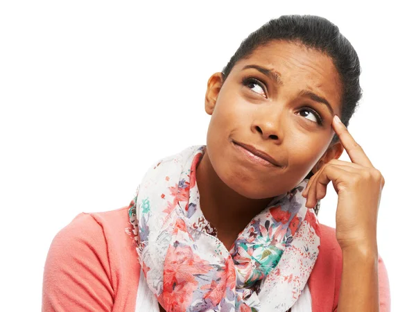 Wishing she could remember.... Cute young woman scratching her head and looking up thoughtfully. — Stock Photo, Image